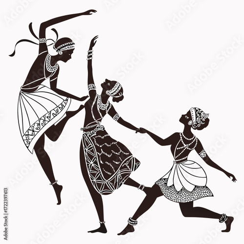 Three graceful female dancers in traditional attire performing an energetic and synchronized cultural dance routine together