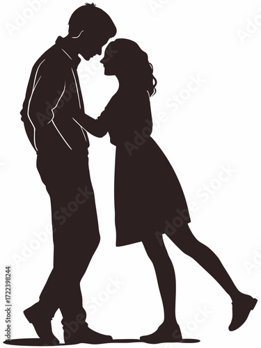 Romantic silhouette of a couple embracing tenderly with foreheads touching in a loving pose