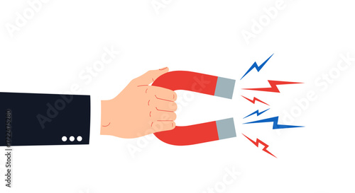 Hand holding a horseshoe magnet attracting energy bolts.