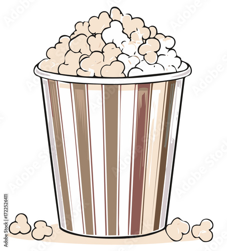 Striped bucket overflowing with fluffy popcorn and scattered kernels