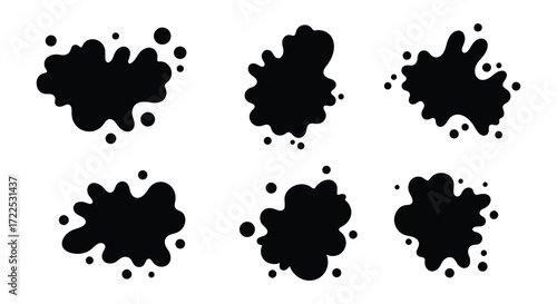 Abstract black ink splatters and blots arranged in a minimalistic composition