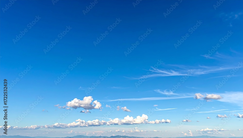Naklejka premium Stunning Blue Sky with Fluffy Clouds.