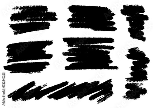 Collection of nine black brush stroke elements on a white background