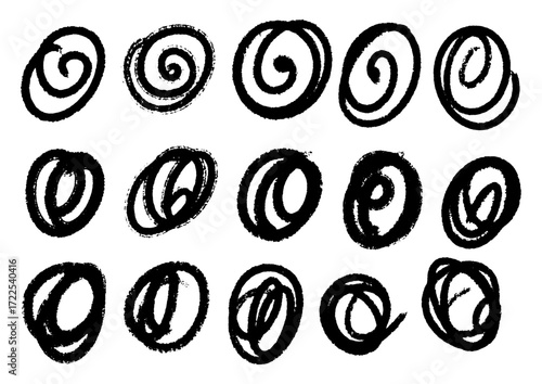 A collection of abstract, hand-drawn circular doodles and scribbles in black and white, perfect for graphic design elements