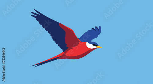 A vibrant red bird with blue wings soars gracefully through a clear blue sky.