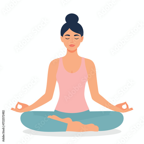 Woman in lotus position meditating with closed eyes, wearing a pink tank top and blue pants.