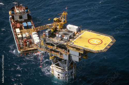 Bream B platform aerial image with work boat alongside, pictured on Bass Strait-Victoria.