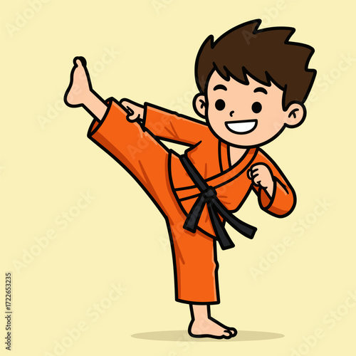 A smiling child with short brown hair performing a high kick in an orange martial arts uniform with a black belt—capturing confidence, motion, and playful discipline.