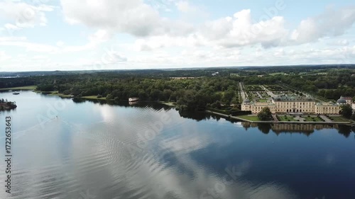 Drottningholm Palace aerial drone view, Stockholm Sweden, UNESCO World Heritage site with lake reflection, baroque architecture and scenic summer landscape
