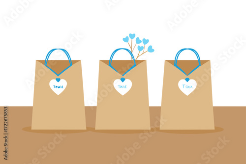 these are three brown paper gift bags lined up on 