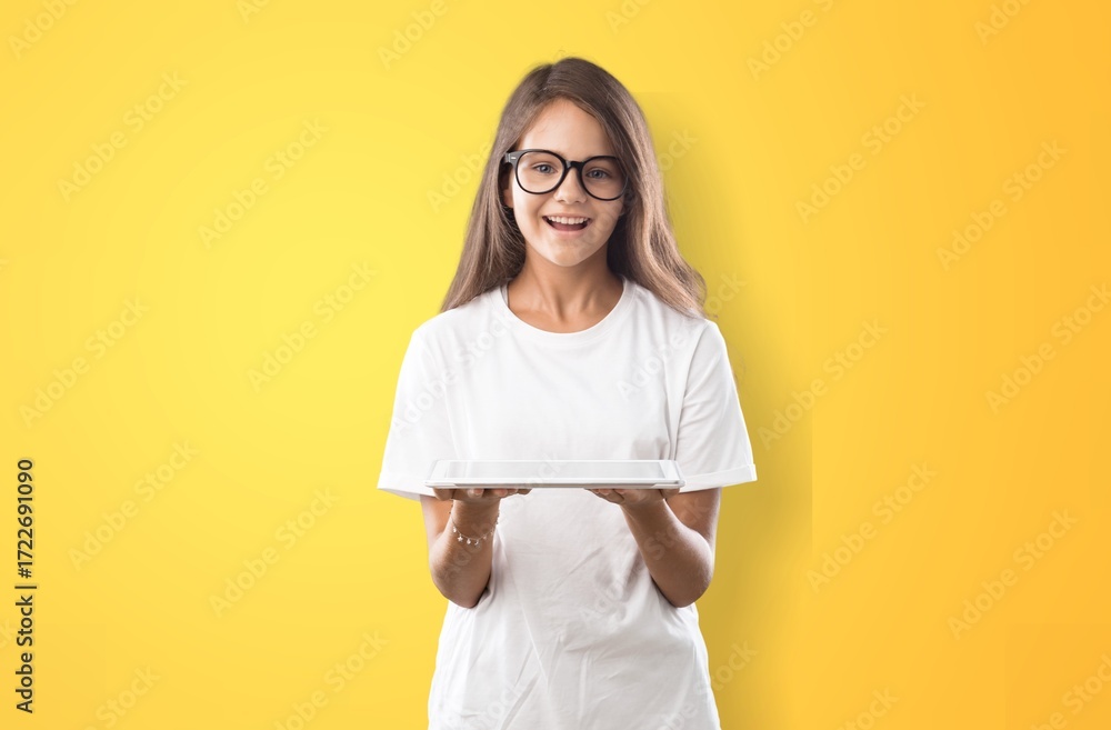 Fototapeta premium E-Learning concept. Happy School child Using Digital Tablet