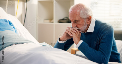 Senior, man and sad with visit hospital for support or care, recovery with empathy for partner. Medical, healthcare and elderly male person in ward with reflection, hope or praying for healing