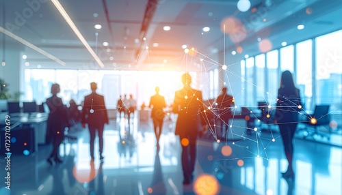 Blurred silhouettes of businesspeople in a modern office space, overlaid with digital connections