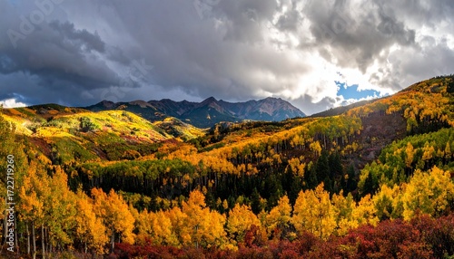 Majestic autumnal mountain scene under a dramatic sky, trees ablaze in vibrant fall colors cascading down the slopes