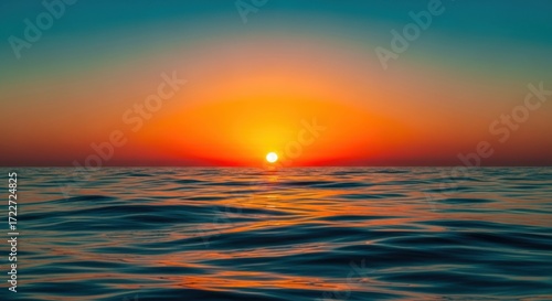 Vibrant sunset over the ocean with gentle waves reflecting the warm colors