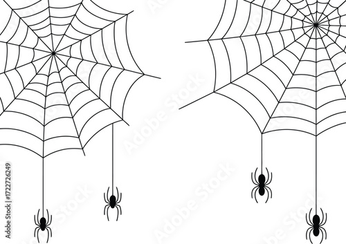 Spooky spiderwebs hang with tiny spiders on white background for Halloween