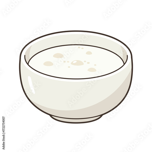 White bowl filled with white liquid, likely soup. Suitable for food blogs, recipe websites, menu designs, culinary social media posts.