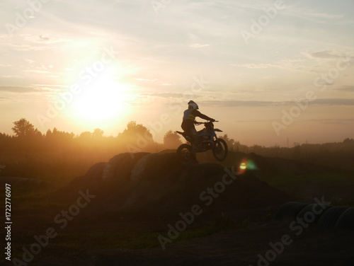 Motocross Rider at Sunset - Silhouette Jump
