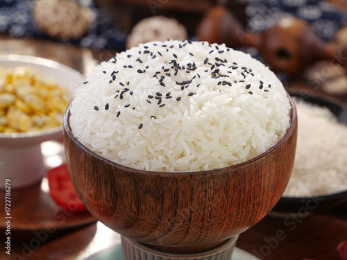 Thai Fragrant Indica Rice with Black Sesame Seeds in Wooden Bowl - Traditional Northeastern Asian Cuisine