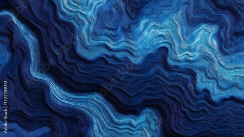 Swirling layers of deep blues and lighter blues create a textured, flowing design