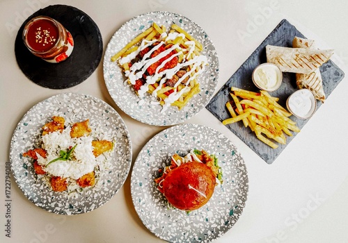 Wallpaper Mural Delicious meat kebab with fresh vegetable salad served with variety of Turkish dishes and appetizers. Top view of assorted Turkish food and meze, tasty and healthy Mediterranean cuisine. Top view. Torontodigital.ca