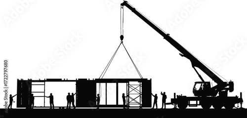silhouette mobile crane lifting prefabricated building module with construction workers teamwork installation process heavy equipment industrial construction site engineering project development 