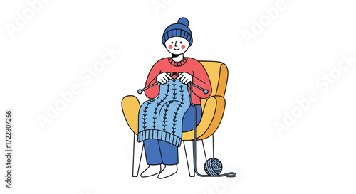 Relaxed woman knitting a cozy blanket while sitting comfortably in her armchair with yarn on the floor indoors at home