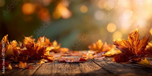Fototapeta Naklejka Na Ścianę i Meble -  Autumn leaves background with golden bokeh and warm sunlight, seasonal fall nature scene backdrop for product display or photography background