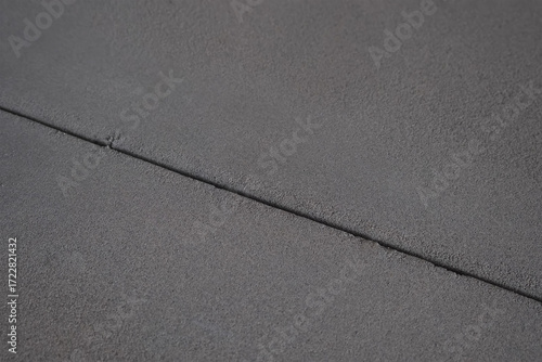 Wallpaper Mural Gap, a joint between concrete slabs in a building with rough finishing. Gray smoothing floor or ceiling from cement. Torontodigital.ca