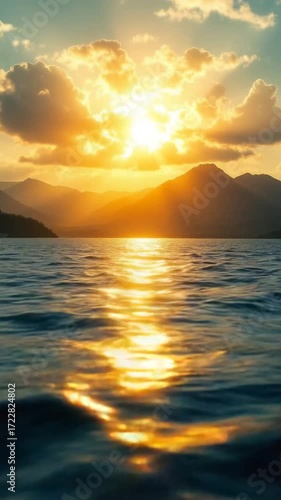 Sunset over water mountain view