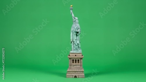 Statue of Liberty model on a green screen background.