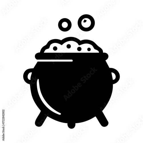 Black cauldron with bubbling potion and steam