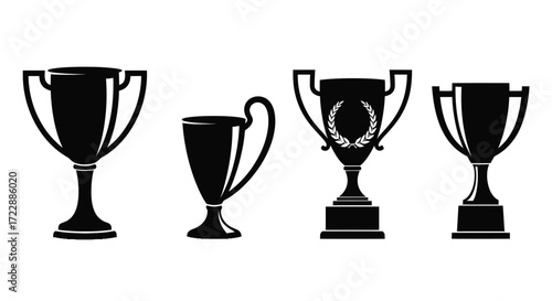Collection of four distinct silhouette trophy awards representing victory and achievement vector