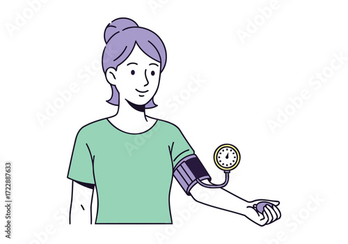 Woman taking her own blood pressure reading