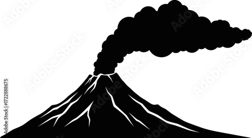 Dramatic volcanic eruption with billowing smoke in a stark black and white landscape