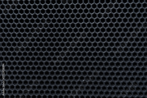 Wallpaper Mural abstract background with a detailed hexagonal texture, perfect for design projects. The dark, repetitive pattern offers a modern, versatile backdrop for creative applications. Torontodigital.ca