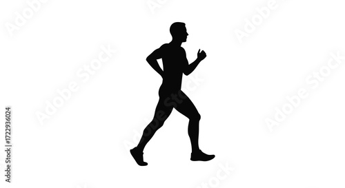 A man running in motion captured as a striking dark silhouette