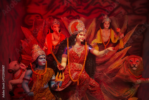 Photography Durga family idol with Shiva Ganesha Kartikeya, Navratri Durga maa family statue, Hindu divine family sculpture, Durga puja decoration with full family stock photo