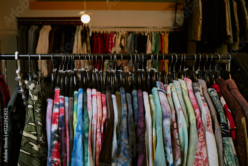 Wallpaper Mural Colorful vintage tie-dye t-shirts hanging on rack in fashion store Torontodigital.ca