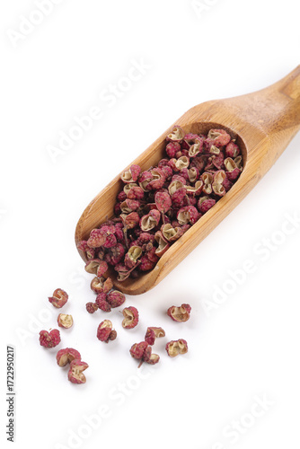 Schilderij op canvas Sichuan Dahongpao Peppercorns in Wooden Spoon - Premium Chinese Spice Grains on