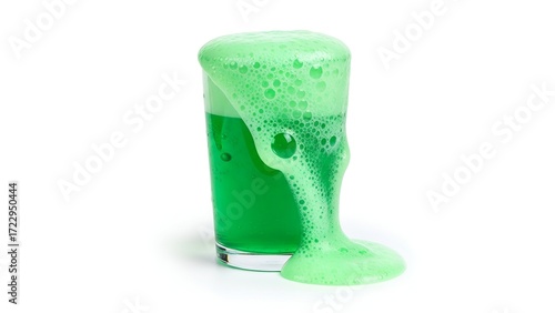 Creepy green slime potion with bubbling foam erupting and overflowing from a glass beaker in a spooky science experiment isolated on a white background