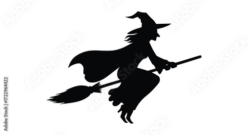 A dark shape of a witch flying on a broomstick silhouette