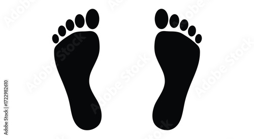 Simple depiction of human footprints against a white background silhouette