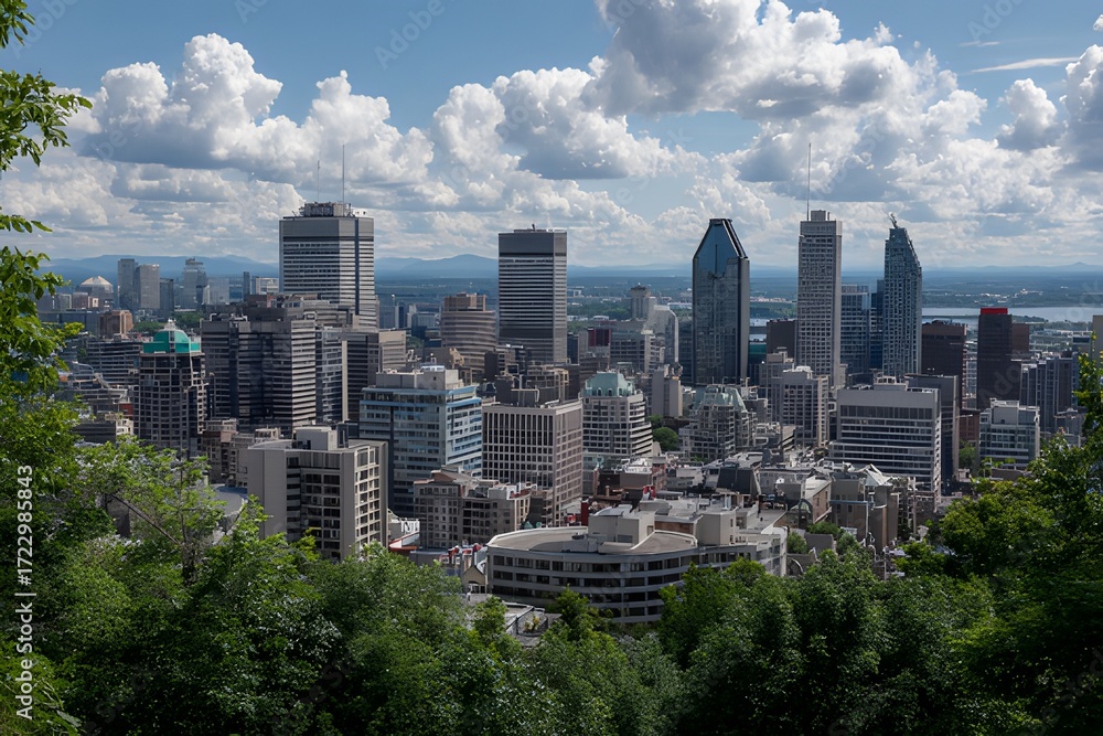 Fototapeta premium Winter panoramic view of downtown Montreal skyline with snow-covered buildings and clear blue sky