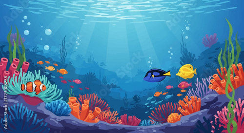 Vibrant underwater scene with colorful coral reef and tropical fish swimming.