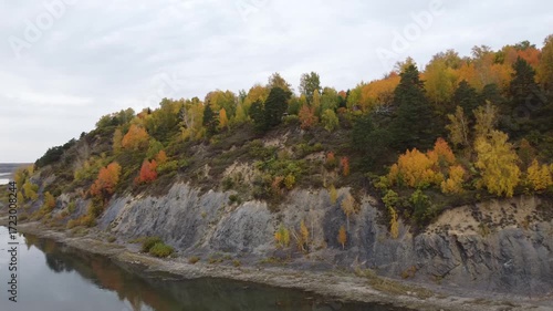 Mountain autumn forest  and river