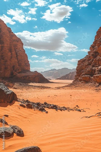 Expansive desert canyon under a vibrant blue sky