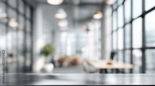 Office desk surface with blurred modern workplace background – business workspace concept