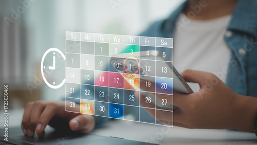Digital calendar scheduling concept with person holding smartphone, marking important date. Ideal for productivity, planning, appointment reminders, and time management on mobile devices.