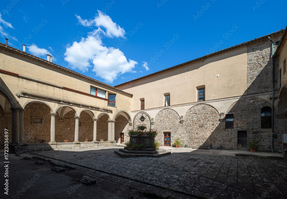 Naklejka premium Cloister of Abbazia di San Salvatore, romanesque styled medieval church in Tuscany, Italy